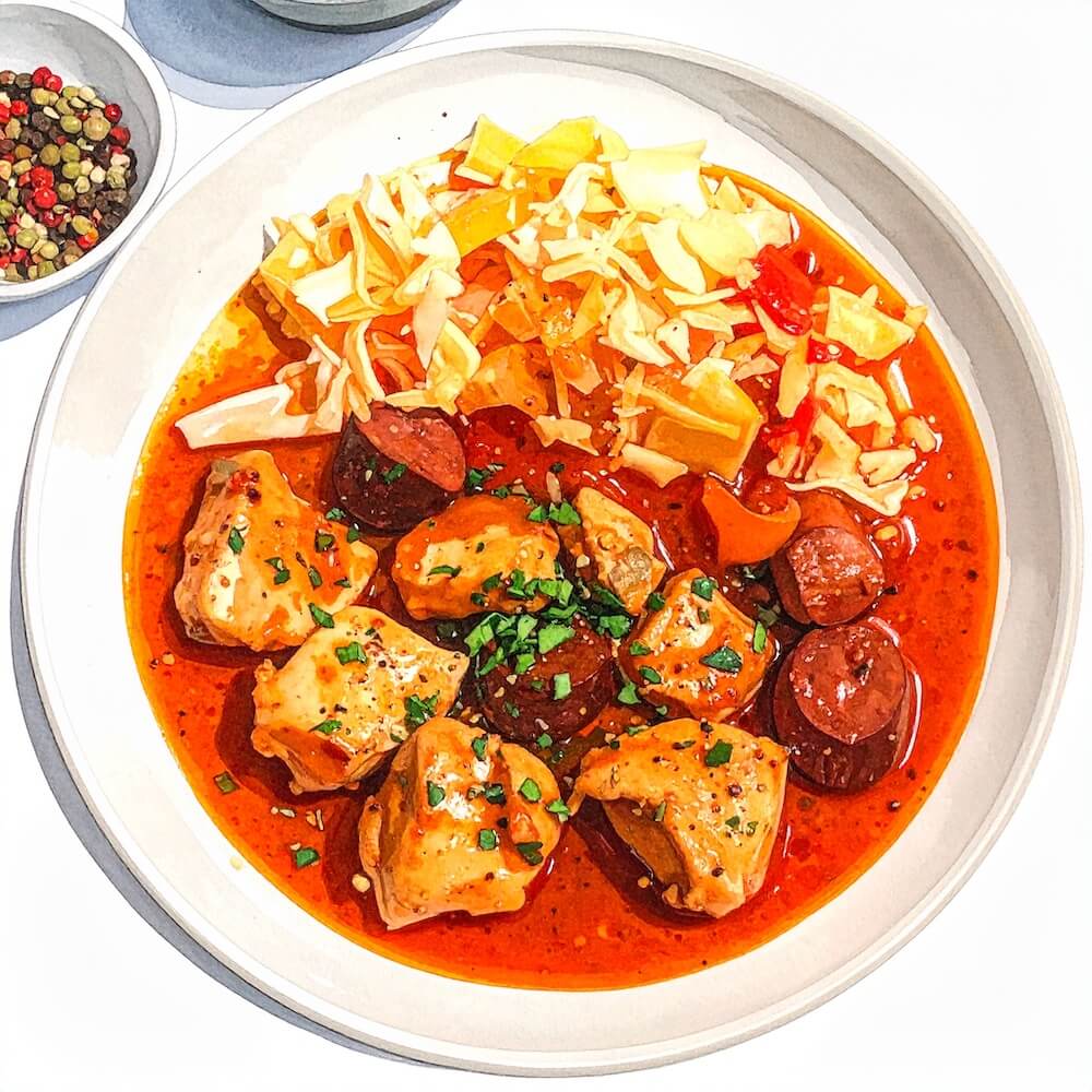 Spanish chicken and chorizo casserole with chickpeas and charred cabbage (gf)
